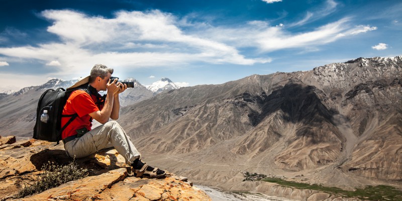 Photographer on the high mountain